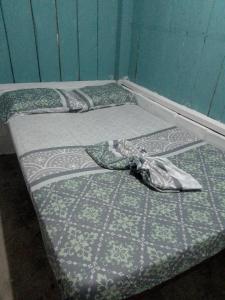 Voodi või voodid majutusasutuse Hostal ladrillerossurf toas