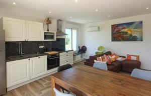 Køkken eller tekøkken på Maison Avec Piscine