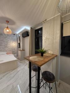 Ένα ή περισσότερα κρεβάτια σε δωμάτιο στο Quiet OldTown Sudio