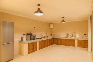 Η κουζίνα ή μικρή κουζίνα στο Luxury apartment with garden view