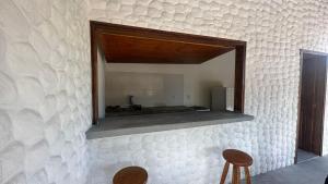 Kuchyň nebo kuchyňský kout v ubytování Chalé Begê