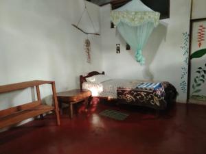 Postel nebo postele na pokoji v ubytování JARDIN DE LAS MUSAS