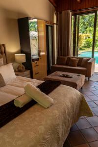 Ένα ή περισσότερα κρεβάτια σε δωμάτιο στο WinOne at Constantia +88 φωτογραφίες