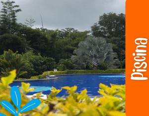 Πισίνα στο ή κοντά στο Hotel Takuara