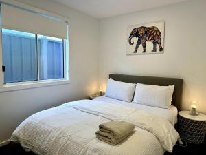 Postel nebo postele na pokoji v ubytování Dunes Purple at Robe