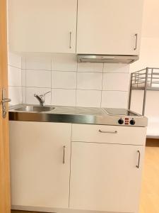 Η κουζίνα ή μικρή κουζίνα στο Hostel City Basel 306