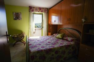 Postel nebo postele na pokoji v ubytování La Brigantessa - Digital Detox in the Abruzzo Mountains