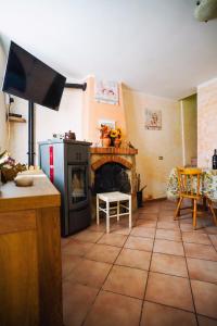 Kuchyň nebo kuchyňský kout v ubytování La Brigantessa - Digital Detox in the Abruzzo Mountains + 13 fotografií