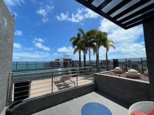 Un balcón o terraza en Apartamento quarto e sala Edifício Time - 1105