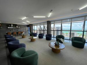 Un lugar para sentarse en Apartamento quarto e sala Edifício Time - 1105