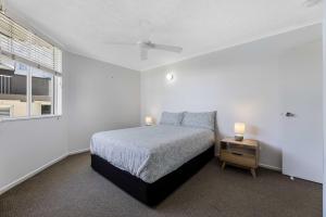 Postel nebo postele na pokoji v ubytování The Outlook unit 9 Currimundi QLD