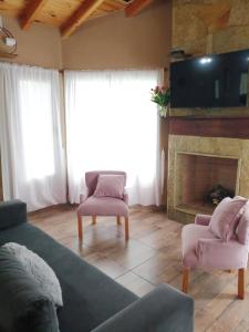 TV a/nebo společenská místnost v ubytování Rincón Bonito