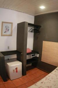 Una cama o camas en una habitación de Pousada Casa Maré