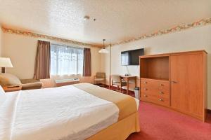 Ένα ή περισσότερα κρεβάτια σε δωμάτιο στο Murphys Suites +43 φωτογραφίες