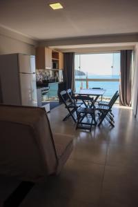 Χώρος καθιστικού στο Catamarã Pé na Areia