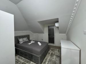 Ένα ή περισσότερα κρεβάτια σε δωμάτιο στο IK Villa