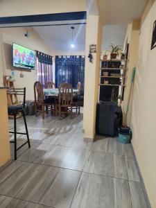 TV a/nebo společenská místnost v ubytování Posada Abuelo Miguel