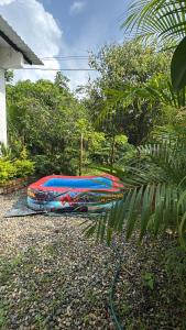 a group of kayaks laying on the ground at Emi House in Acacías