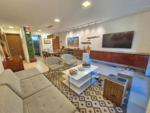 Et tv og/eller underholdning på Apartamento terreo no reserva dos Carneiros