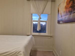 Ένα ή περισσότερα κρεβάτια σε δωμάτιο στο John's House in Vancouver West