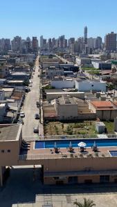 an aerial view of a city with buildings at Ap sol nascente in Itapema