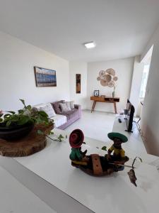 Et opholdsområde på Apartamento Tranquilidade de Vilas do Atlântico + 14 billeder