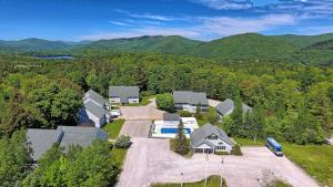 an aerial view of a home in the mountains at Killington Center Renovated Studio with Kitchenette on Bus Route and Discounted Ski Rentals in The Woods