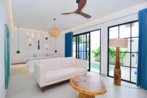 Postel nebo postele na pokoji v ubytování The Koho Air Hotel + 76 fotografií