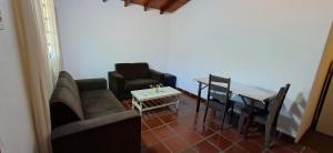 A seating area at Casa Micha - Hospedaje temporal en Asunción