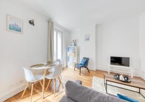 TV a/nebo společenská místnost v ubytování le cosy pantin