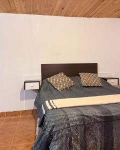 En eller flere senge i et værelse på Departamento céntrico moderno minimalista