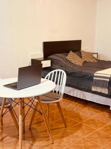 En eller flere senge i et værelse på Departamento céntrico moderno minimalista