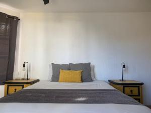 Ένα ή περισσότερα κρεβάτια σε δωμάτιο στο Casa Hidalgo Hideaway