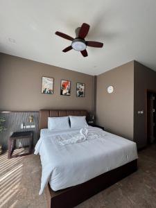 Ένα ή περισσότερα κρεβάτια σε δωμάτιο στο Me luxe hotel