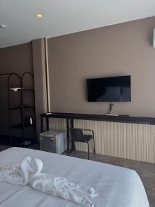 TV a/nebo společenská místnost v ubytování Me luxe hotel