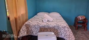 Postel nebo postele na pokoji v ubytování cabaña Carol