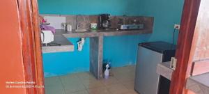 Kuchyň nebo kuchyňský kout v ubytování cabaña Carol