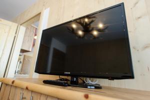 A television and/or entertainment centre at Ferienpark Gaal