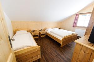 A bed or beds in a room at Ferienpark Gaal