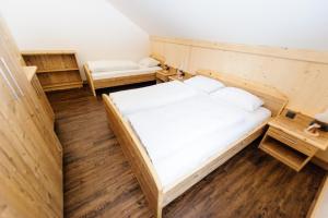 A bed or beds in a room at Ferienpark Gaal