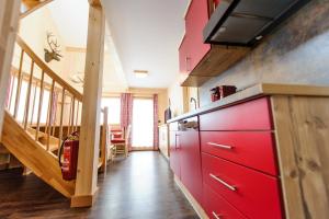 A kitchen or kitchenette at Ferienpark Gaal