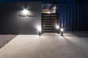 a door to a building with lights on it at 淡路島 Villa Paddle - Self Check-In Only in Sumoto