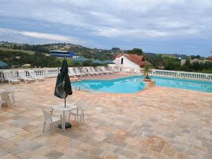 Bazén v ubytování Piemonte Flat 104 B nebo v jeho okolí