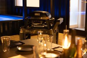 a printer sitting on top of a table at 淡路島 Villa Paddle - Self Check-In Only in Sumoto +13 photos