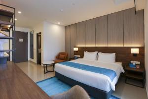 Postel nebo postele na pokoji v ubytování 1001 Nights Boutique Genting Highlands