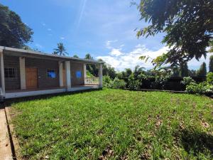 Κήπος έξω από το Mi pueblo Hostal Nahuizalco +15 φωτογραφίες