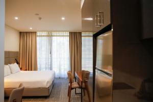 Postel nebo postele na pokoji v ubytování Quest Kings Park + 31 fotografií