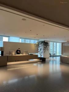 Ο χώρος του λόμπι ή της ρεσεψιόν στο ShenZhen Platinum Collection Service Apt