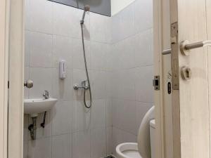 Ένα μπάνιο στο Sighma Kayon Perumnas