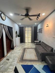 Posezení v ubytování Twins Homestay + 1 fotografie